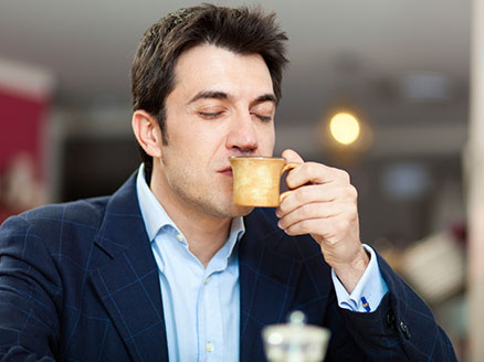 drink a cup of coffee