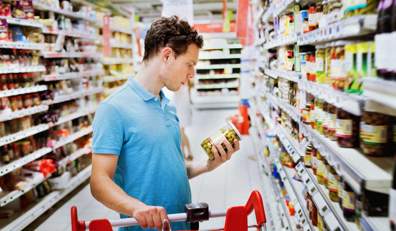 man buying in supermarket