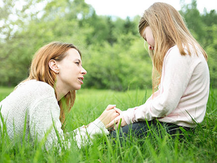 mother cheering daughter