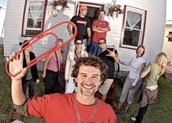 Kyle MacDonald with his house