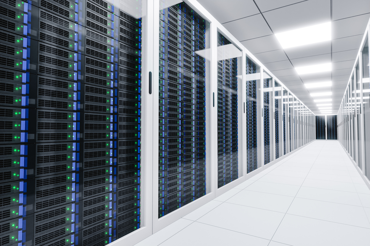 A large, modern data center with rows of servers.