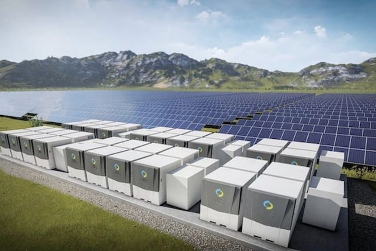 A large battery grid storage facility with rows of battery units.